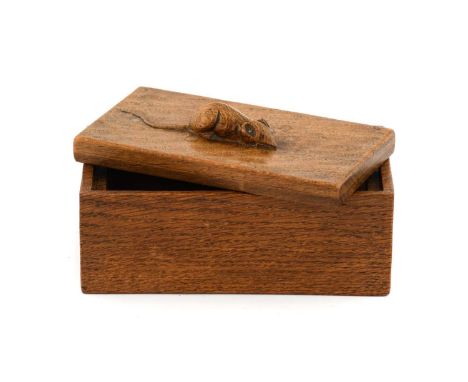 Robert Mouseman Thompson (1876-1955): An English Oak Trinket Box and Cover, of rectangular form, the recessed cover with carv