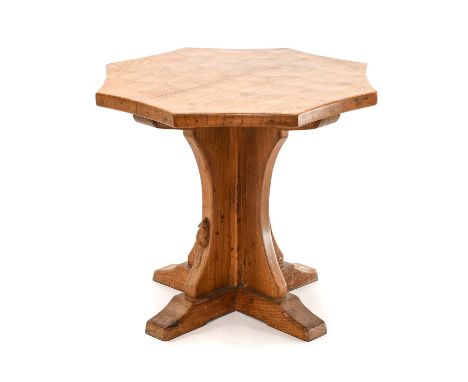 Workshop of Robert Mouseman Thompson (Kilburn): An English Oak Octagonal Coffee Table, adzed top, on a cruciform base, with c