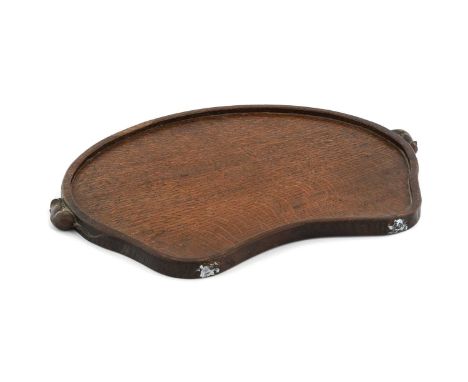 Robert Mouseman Thompson (1876-1955): An English Oak Kidney Tea Tray, with carved mouse trademark handles, 48cm wideGeorge Ca