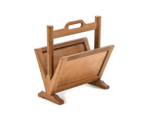 Workshop of Robert Mouseman Thompson (Kilburn): An English Oak Magazine Rack, with carrying handle between two octagonal upri