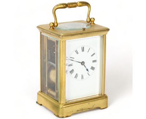 French brass-cased carriage clock with enamel dial and 8-day striking movement, case height 13cmCase slightly tarnished but n