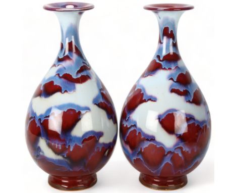 Pair of Chinese mottled sang de boeuf glaze narrow-neck vases, with impressed marks, height 35cmGood condition, no chips crac