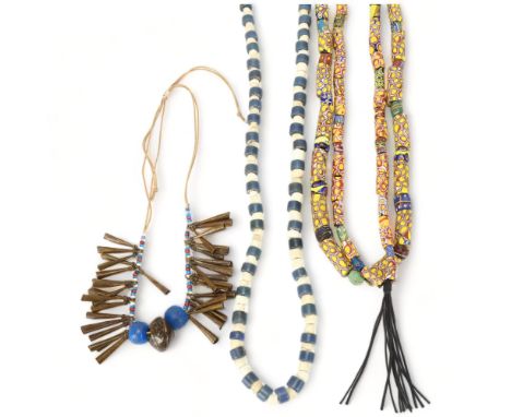 Three strings of African tribal beads, glass millefiore, blue and white Ugandan beads and North African brass and coloured be
