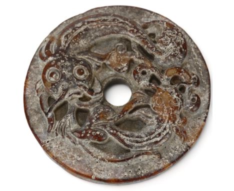 A Chinese jade bi-disc with relief carved catfish design, diameter 5.5cmGood condition 