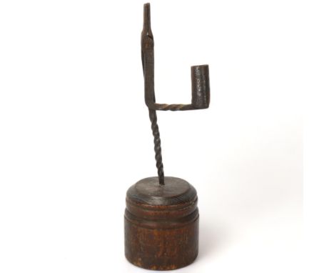 18th century wrought-iron rush light holder, on oak base, height 30cmGood condition 