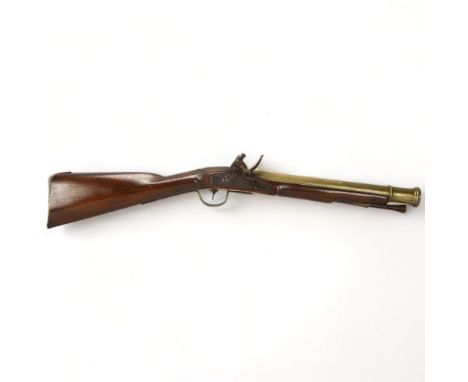 A 19th century flintlock brass-barrelled blunderbuss, with mahogany stock, impressed marks to the barrel, barrel length 38cm,