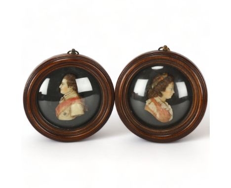 A pair of coloured wax portraits of George III and Queen Charlotte, in mahogany frame with convex glass, diameter 15.5cmBoth 