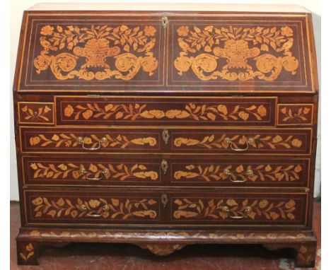 19th century Dutch marquetry bureau, the slope front decorated with urns of flowers and birds opening to reveal a well and st