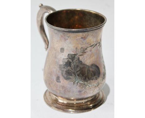 George II silver mug of baluster shape, 1755, 6oz. Condition Report Patch in front covered by engraved wreath.  Otherwise ok.