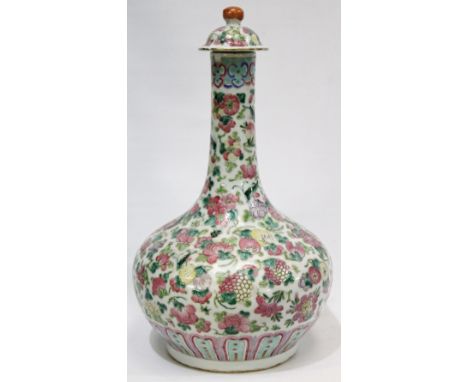 Chinese late 19th century Canton famille rose bottle vase and domed cover, the body decorated with flowers, birds and insects