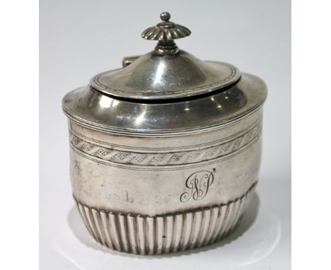 Silver caddy of oval, part fluted form with engraved band, for Thomas, London 1892, 5½oz. Condition Report Some wear, various