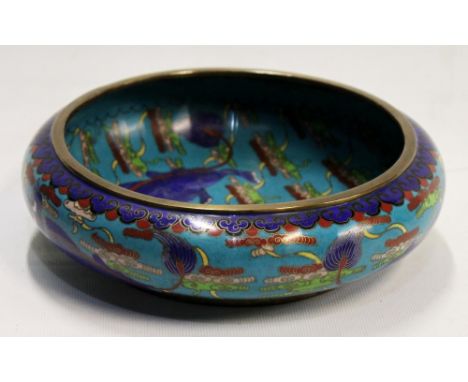 20th century shallow cloisonné enamel bowl decorated with mythical animals, 20cm diameter.