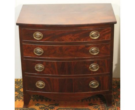 19th century dwarf mahogany bowfront chest of four long drawers raised on bracket feet, 62cm wide and 61cm high.