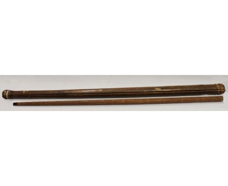 Indian sandalwood walking stick carved with cobras, exotic birds, floral and geometric panels, 95cm long, contained within a 