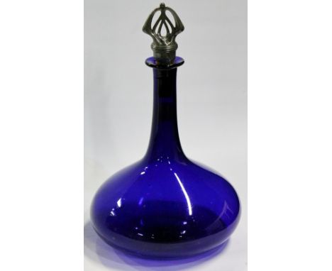 19th century Bristol Blue glass ship's style decanter, with pewter-mounted cork stopper, 29cm high.