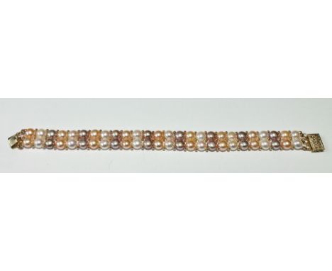 Coloured pearl bracelet on gold snap, '14K'. Condition Report 17.3g
