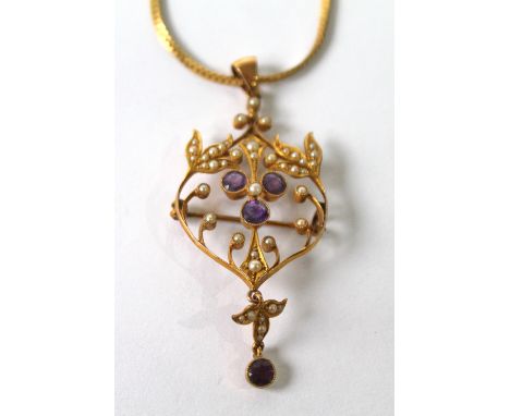 Edwardian amethyst and pearl open work pendant, '9ct', on necklet. Condition Report Good condition.
