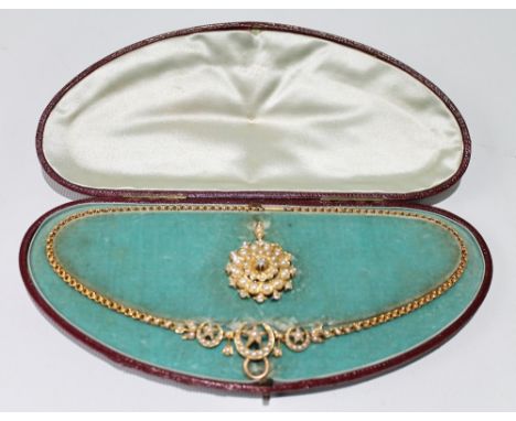 Victorian pearl and diamond target brooch with necklet of crescents and stars, dated 1899, cased. Condition Report Very good 