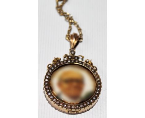 Locket pendant with pearl border, '9ct', metal necklet.