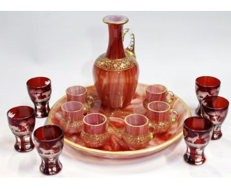 Gilt decorated swirl glass tray with liqueur decanter and six liqueur cups, 24cm diameter and 16cm high, also a set of six et