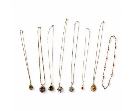        A collection of yellow gold necklaces and pendants to include a 9ct gold beaded necklace; a sapphire and diamond penda