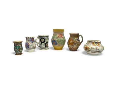 Charlotte Rhead for Crown Ducal, a collection of jugs and vases, to include four examples in palette variations of the Tudor/