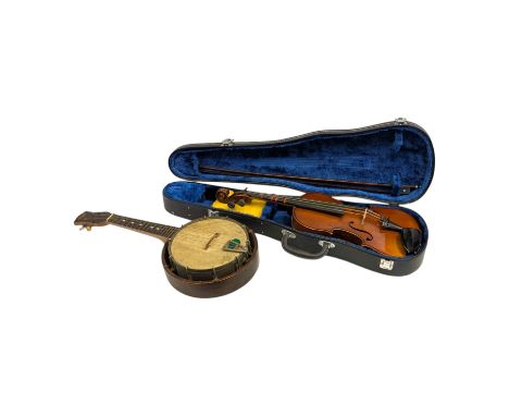 A 20th century German violin, two piece back, the bridge marked Bausch, in a fitted case with a mother of pearl inlaid bow, t