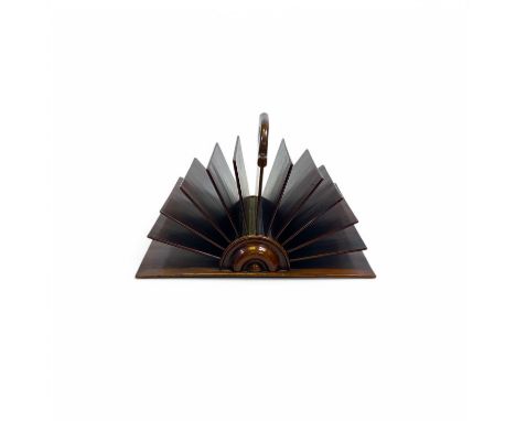 A 19th century mahogany fan shaped letter rack, with central carry handle  18cm high  Provenance: From the estate of a privat