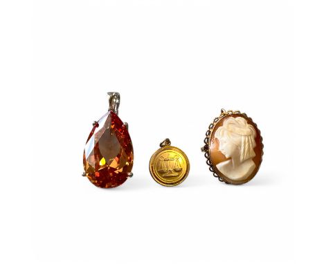 9ct Yellow Gold Mounted Cameo Brooch 3,3cm x 2.6cm Along With A 9ct Gold Scales Charm And A Silver & CZ Pendant.  Gross Silve