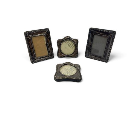 Two pairs of small sterling silver photo frames, green & Cadbury Ltd Birmingham 1916 & 1938. Rectangular 6.5cm x 5 cm, Hammer