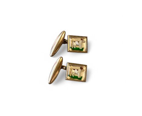 A pair of gold plated hound cufflinks.