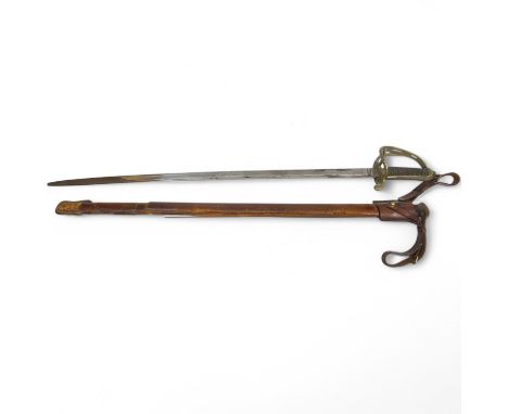 An early 20th century Royal Artillery officer's sword, with a wire bound shagreen grip, brass hilt and a curved blade etched 