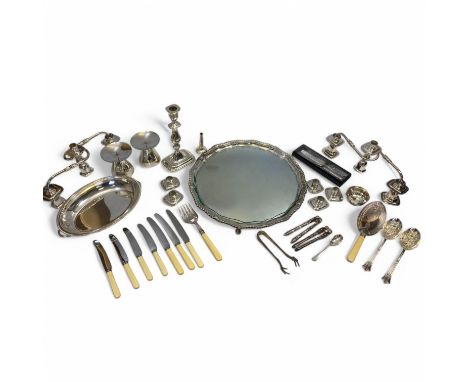 A large quantity of silver plated items, to include salvers, jugs, candlesticks, photo frames, goblets, candelabra, etc (qty)
