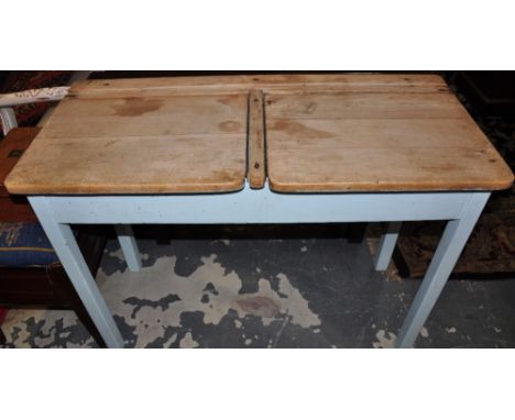 A vintage pine and beech double hinge top students desk with painted base, w:100cm