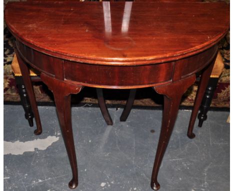 An early 20th Century mahogany card table on cabriole legs, W. 92cm