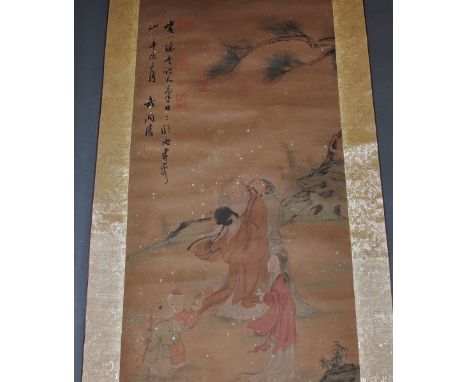 A Chinese rolled scroll, painted with a figural scene and calligraphy  