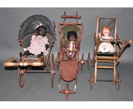 A late Victorian child's pram, together with two similar examples, each with vintage doll on board