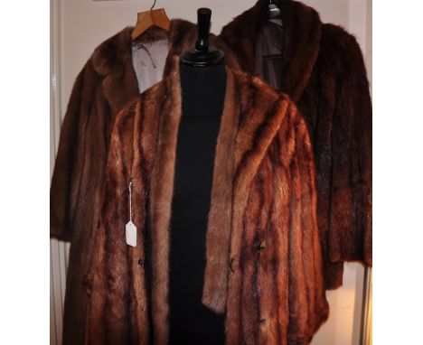 A ladies vintage mink three quarter length coat, together with together with two further brown fur coats