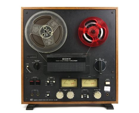 Sony TC-399 Reel To Reel audio player / recorder. takes up to 7 inch reels. Comes with ten used reels and one smaller empty r