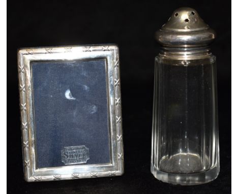 TWO ITEMS OF SILVERWARE  Comprising a modern Mappin &amp; Webb small silver photograph frame with easel stand, 11cm x 8cm; an