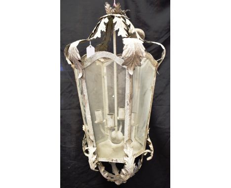 A LARGE FOUR LIGHT METAL FRAMED HANGING LIGHT FITTING of tapering hexagonal form, 75cm high (excluding hanging chain) Conditi