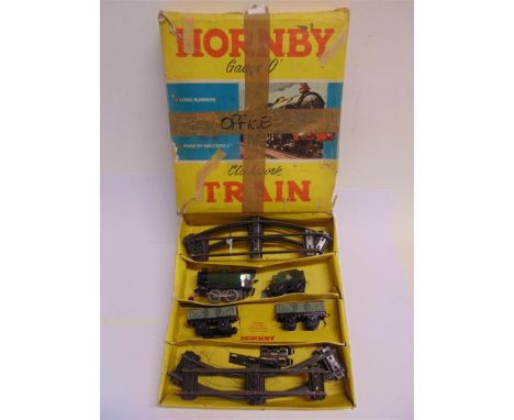 [O GAUGE]. A HORNBY NO.20, GOODS SET  comprising a B.R. 0-4-0 tender locomotive, 60985, with a clockwork motor (working), two