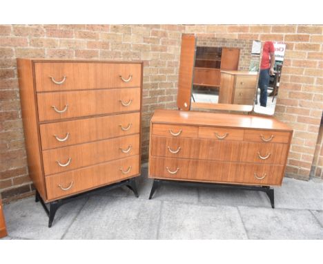 A G-PLAN STYLE FIVE DRAWER CHEST  and matching dressing chest, each with loop handles and ebonised bases, the chest 76cm wide