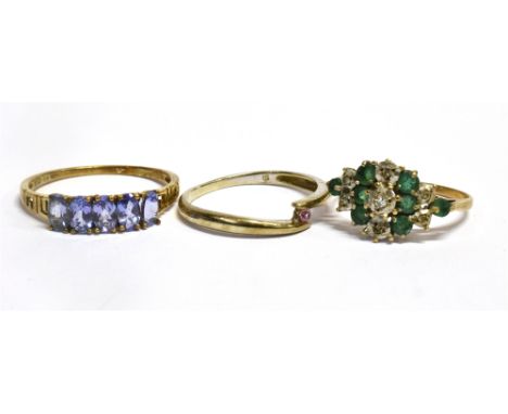 THREE COLOURED STONE SET 9CT GOLD DRESS RINGS  Comprising a tanzanite five stone, size T, an emerald and small illusion set d