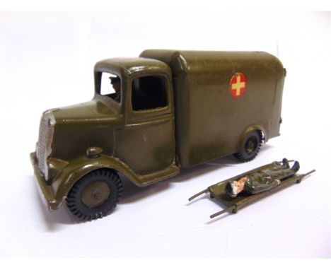 A BRITAINS NO.1512, ARMY AMBULANCE  khaki green with white crosses in red roundels, very good condition, complete with driver