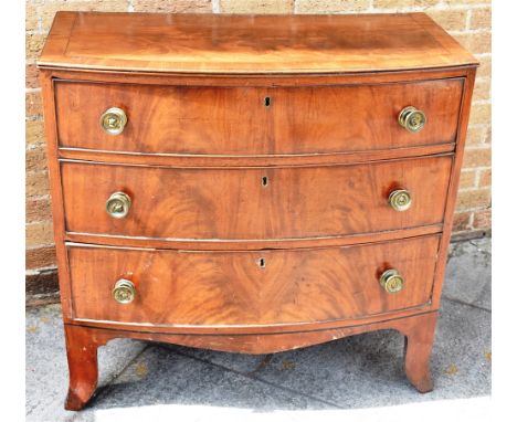 BOWFRONTED CHEST OF THREE LONG GRADUATING DRAWERS, raised on bracket feet, 89cm x 91cm x 46cm