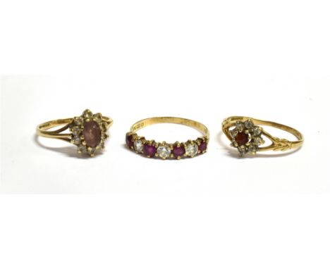 THREE WHITE AND COLOURED STONE SET 9CT GOLD DRESS RINGS Comprising two clusters and a seven stone, sizes O, J and O total gro