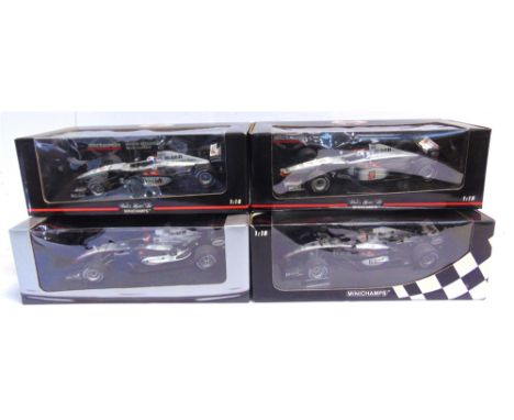 FOUR 1/18 SCALE MCLAREN FORMULA 1 RACING CARS  comprising a Minichamps No.530 001802, McLaren Mercedes MP4/16, D. Coulthard; 