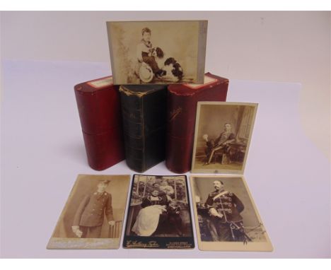 PHOTOGRAPHS - ASSORTED  Approximately seventy-five cabinet and twelve carte-de-visite portrait photographs, in three book-for