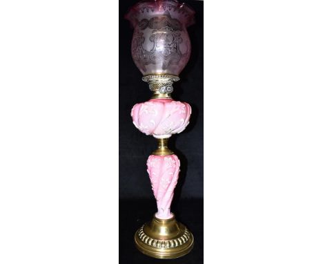 A GOOD LATE VICTORIAN/EDWARDIAN OIL LAMP  the acid-etched vaseline glass shade with frilled rim, double wick burner, the pink